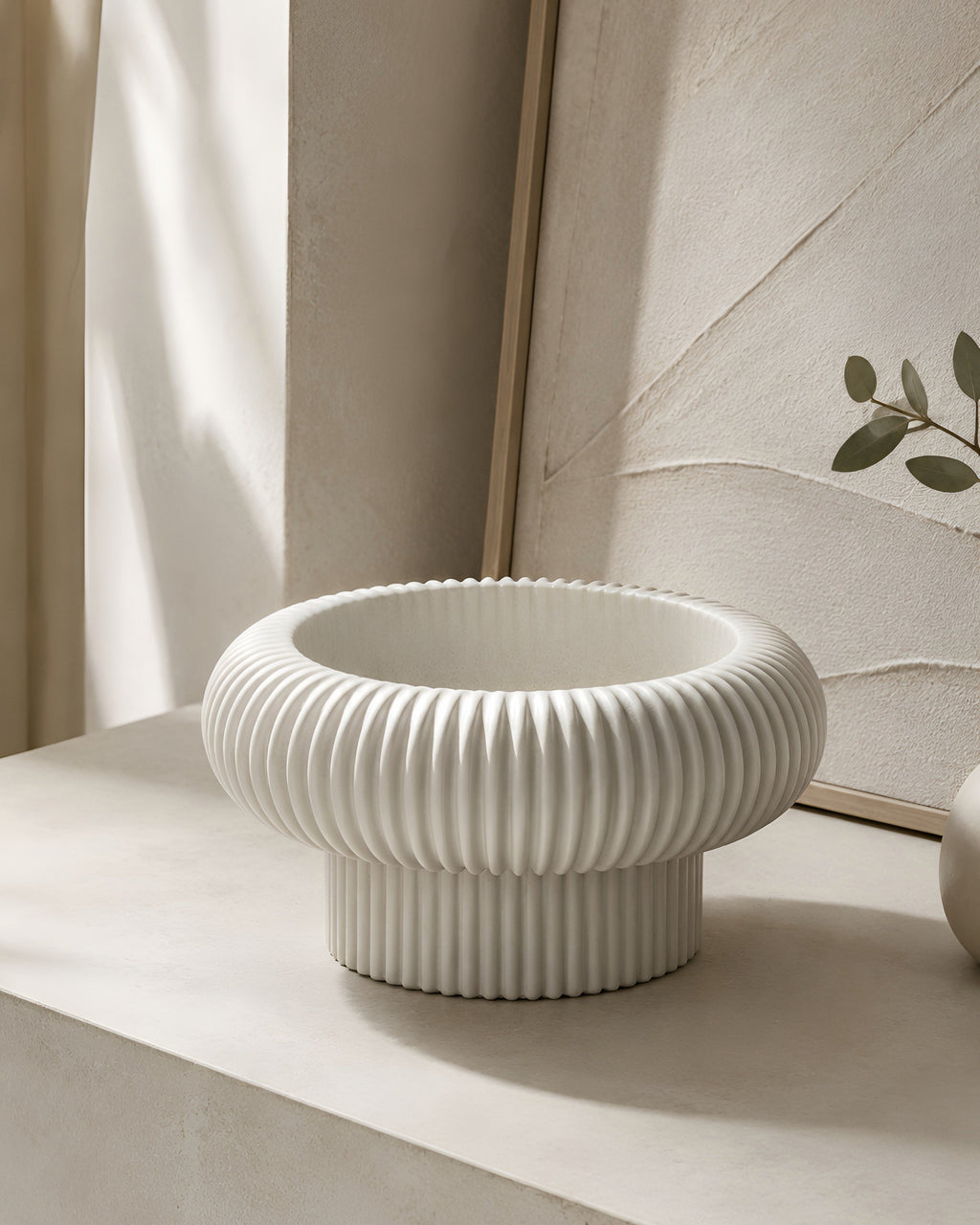 The Opra ribbed pedestal bowl