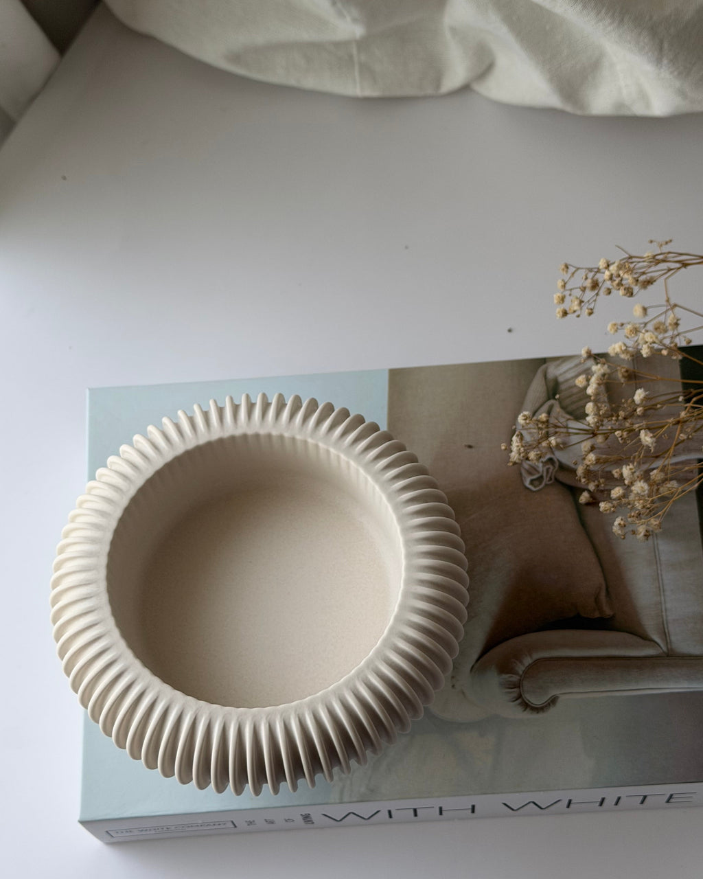 The Opra ribbed pedestal bowl